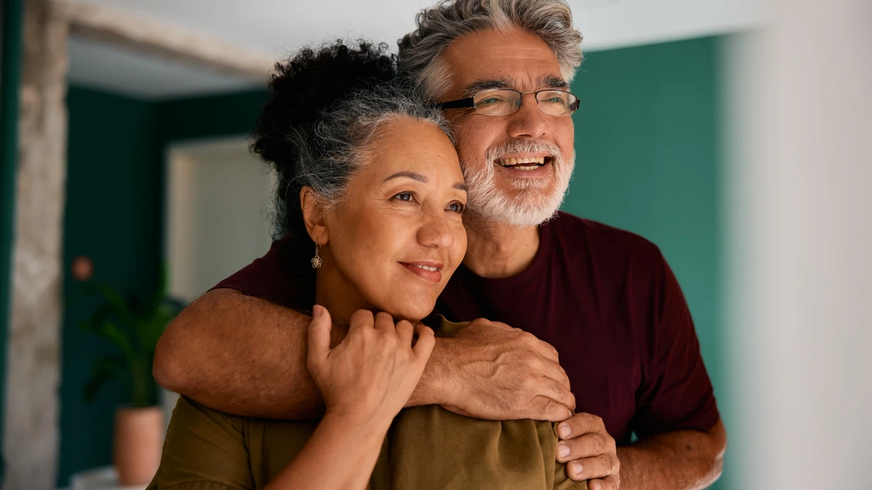 A couple sharing a happy moment together at home